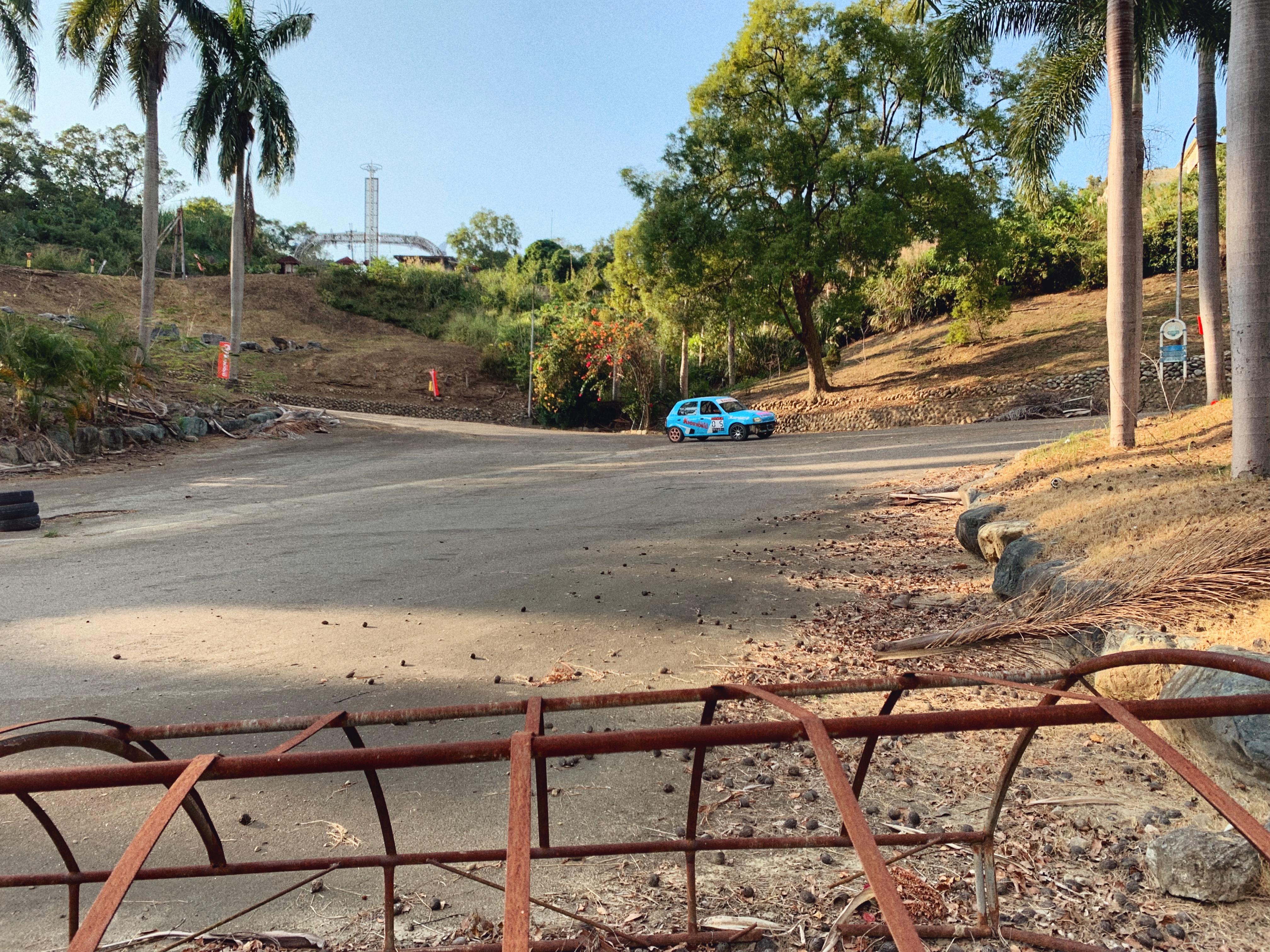 A blue car on a racetrack