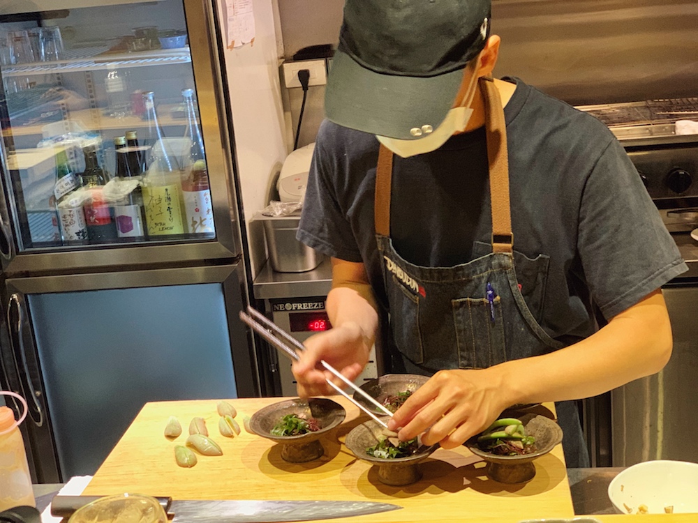 Placing the stone lotus leaves on the salad