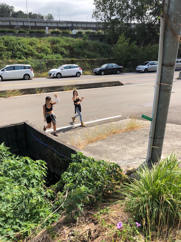 Hikers crossing the road to enter the hike. Me and Rachel crossing the road to the hike with our celebratory PBJs.